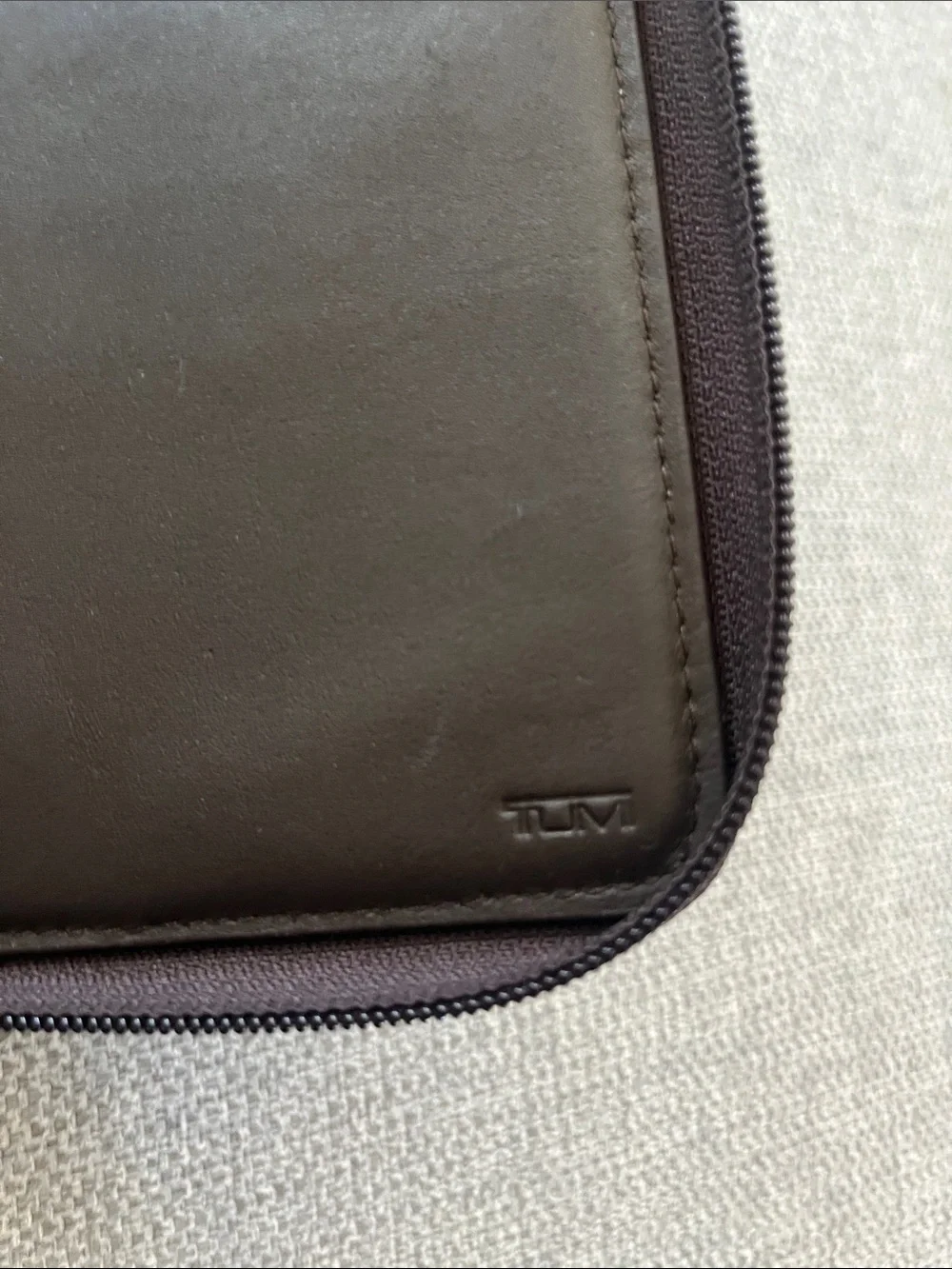 Tumi compact zip